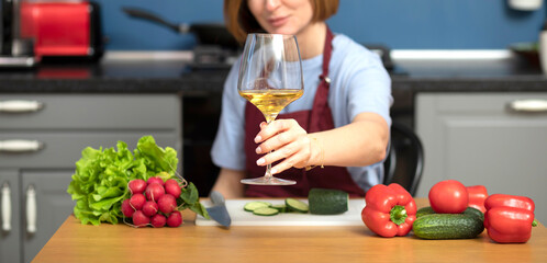 Desperate housewife decided to drink wine while cooking