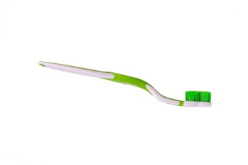 Closeup of toothbrush isolated on white background.