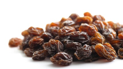 Obraz premium A pile of raisins on a white surface