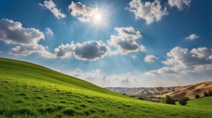 Fototapeta premium Endless green hill, meadows, blue sky with white clouds, sunrise, peace. Space for text