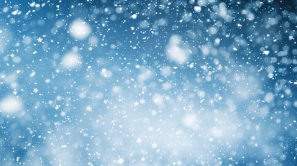 Obraz premium Snowy night scene with a blue background, snowflakes, and stars