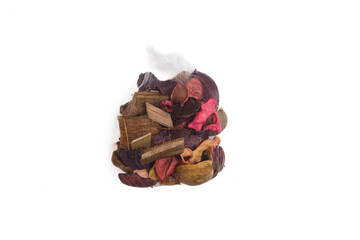 Potpourri sachet isolated on white background. Image of aromatherapy sachet of colorful roses petals. Scented bags, fragrant flowers. Isolated on white background
