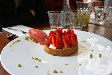 Close up Strawberry Tart with Pastry Cream and sorbet ice cream gelato