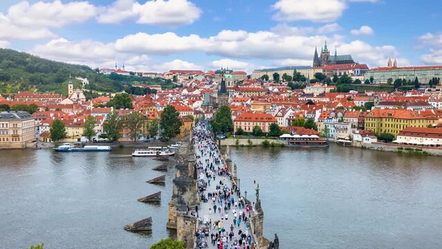 Time lapse view of the Charles Bridge and old town of Prague during a sunny summer day, Czech Republic