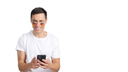German man looking at his mobile smiling and showing it.