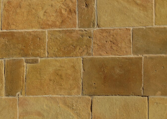 yellow stone wall background