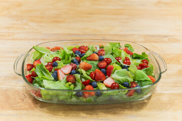 Fresh and Healthy salad. Vegetarian Vegetable Salad and fruit for vitamins.