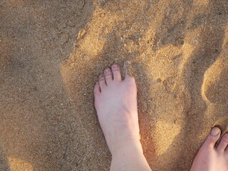 pieds dans le sable