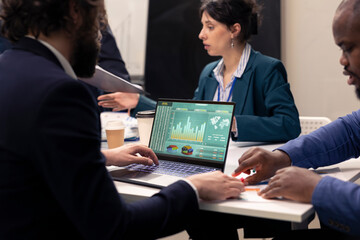 Marketing team developing new digital transformation strategies in a boardroom conference, enhance operational efficiency and performance. Professionals improve organizational workflow.