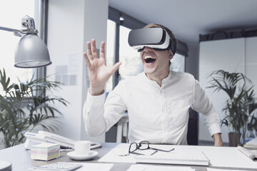 Young businessman experiencing virtual reality
