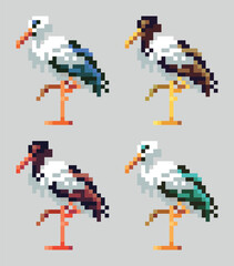 Obraz premium stork set tiny pixel art cartoon character set pixel art style vector illustration various patterns and colors