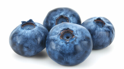 Four blueberries are shown in a close up