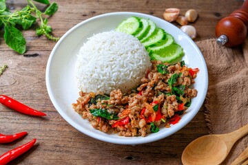 Rice topped with stir fried Thai basil with minced pork , pad ka praow moo sap,Thai food, top view food table