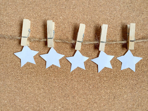 Five stars rating concept background. Stock photo.