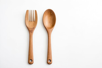 Wooden spoon and fork on white background