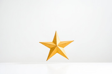 Obraz premium Golden Star on White Background