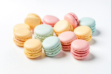 Obraz premium Colorful Macarons on White Background