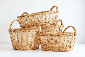 Fototapeta premium Stack of Four Brown Wicker Baskets