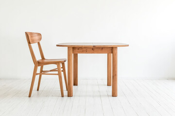 Wooden table and chair in white room