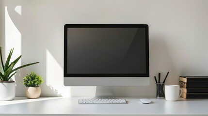 Fototapeta premium Close up Minimalistic workspace with computer modern designer desktop with blank computer screen, office equipment decorations on table. Mock up