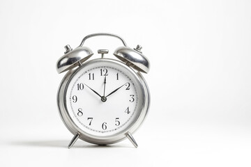 Classic Silver Alarm Clock On White Background