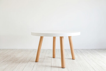 White Table with Wooden Legs on White Wood Floor