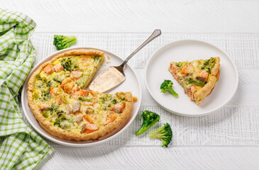 Homemade pie with salmon and broccoli