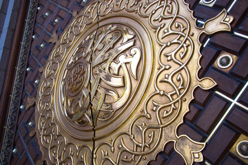 Muhammad Rasulullah. The Prophet Muhammad's name written on the door of the mosque Nabawi in Medina, Saudi Arabia: 2 September 2018