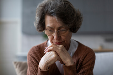 Confused worried old lady suffering from age disorders, Alzheimer disease, woman feeling anxiety,...