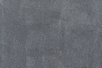 New asphalt texture. A frame filled with the textured surface of dry asphalt, showcasing the detailed pattern