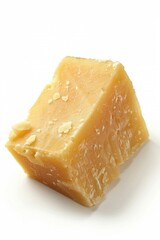 A single piece of cheese sitting on a clean and plain white surface, great for food or product photography