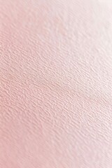 A close-up shot of a pink leather surface with texture and pattern