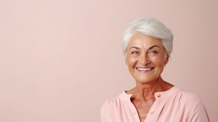 Photograph of a joyful elderly European woman with short gray hair, wearing stylish pink sunglasses and a pink shirt, smiling against a pink background, horizontal with copy space.

Senior woman,