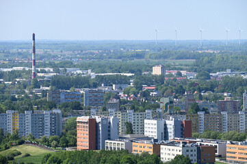 View of the city. Above the city. Aerial view of streets and houses in Koszalin, Poland. View from the observation tower in Góra Chełmska. 