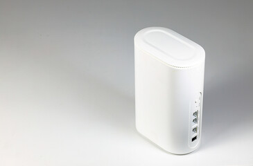 Close up dual band wi-fi 6 router on white table.