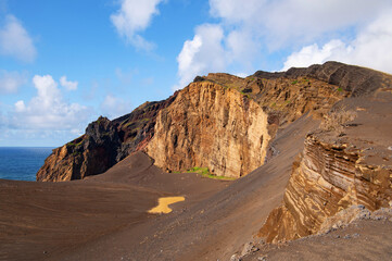 The Capelinhos volcano on Faial Island, the Azores, Portugal. Volcanic complex of Capelo. Caldera of Caldeira Volcano. Atlantic ocean coast. IUGS geological heritage site. © Lizaveta