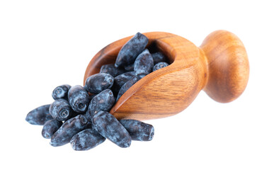 Honeysuckle in wooden scoop, isolated on white background. Fresh honeysuckle blue berry fruits. Clipping path.