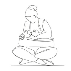 mother breastfeeding newborn