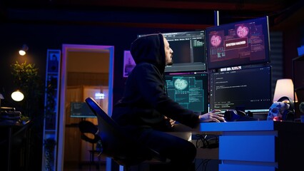 Cheerful hacker in apartment doing energic celebration after managing to steal sensitive data....