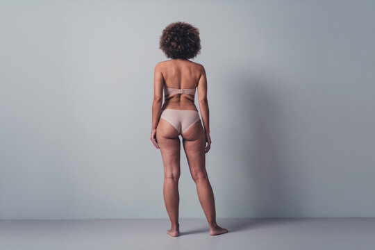 Unretouched photo of lady wear brand lingerie promoting feel comfortable with fat folds