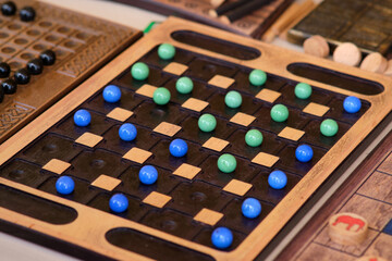 Bolotudu is a board game from the category of abstract strategies, originally from Sudan