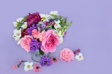 English summer flowers and herbs in a vase and loose. Flora used in natural herbal medicine flower...
