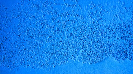 Dark blue cement wall, raw cement surface wall textured 16:9 background