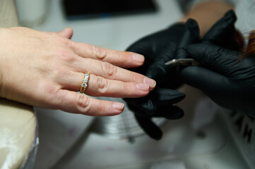 Close-up of manicure process in a beauty salon