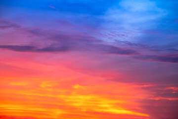 Obraz premium Beautiful , luxury soft gradient orange gold clouds and sunlight on the blue sky perfect for the background, take in everning,Twilight, Large size, high definition landscape photo