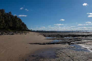 Rocky platform on the beach shore.