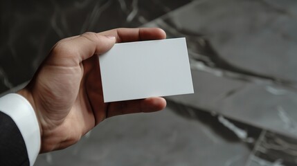 Suit man holding blank card mockup against blurred stone background. Company contact. Businesscard template advertising image. Office worker. Professional mock up product photorealistic