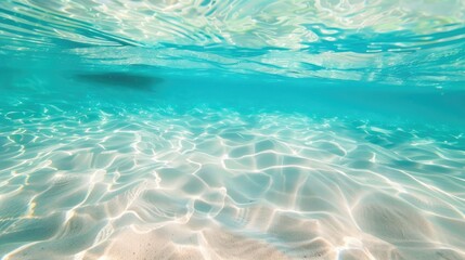 White sand underneath clear water appears blurred and gentle