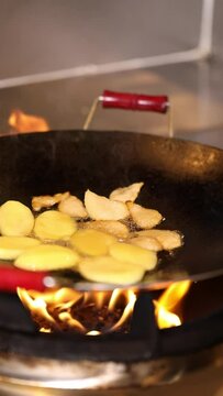Close up of male hand cooking food