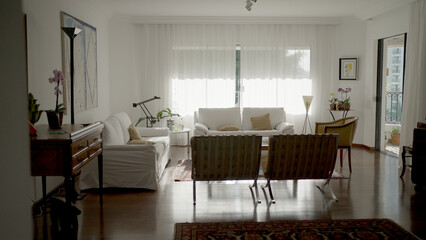Elegant Living Room with Natural Light and Vintage Furniture - Interior Design Inspiration